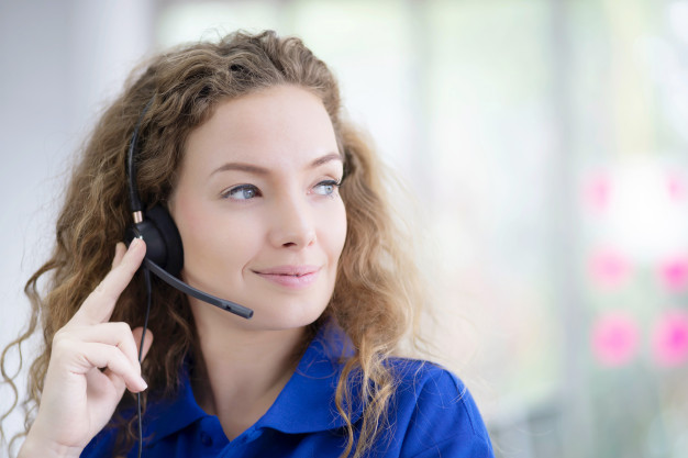 portrait-woman-smiling-blue-shirt-working-headset_109549-62.jpg